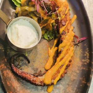 OCTOPUS marinated & grilled with pickled cucumber salad in mojo canario dressing and served with aioli (GF, DF opt)
