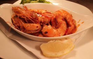 GAMBAS pan fried in garlic butter or pil pil sauce served with toasted French bread (GF opt)